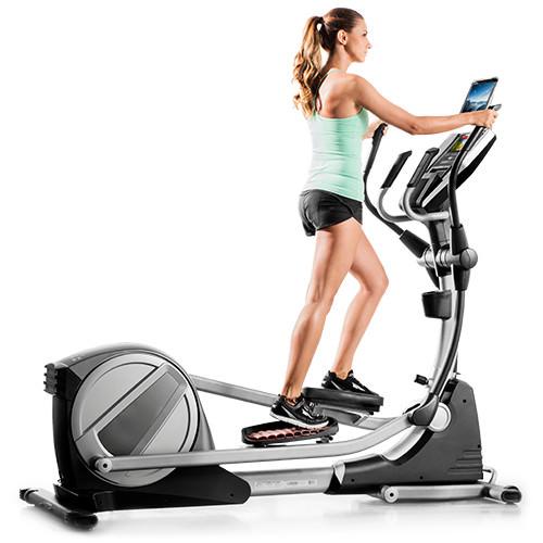 A woman working out using Proform Smartstrider 895 CSE
