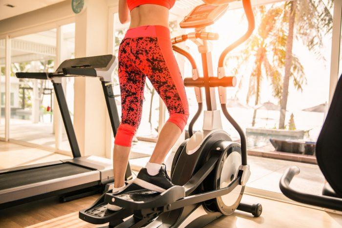 female on elliptical machine