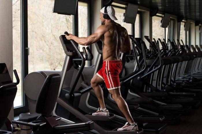 male on elliptical machine