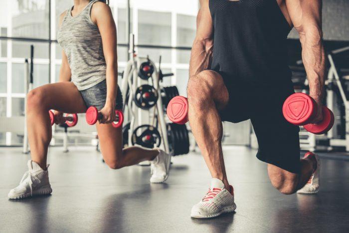 Gym-goers doing lunges